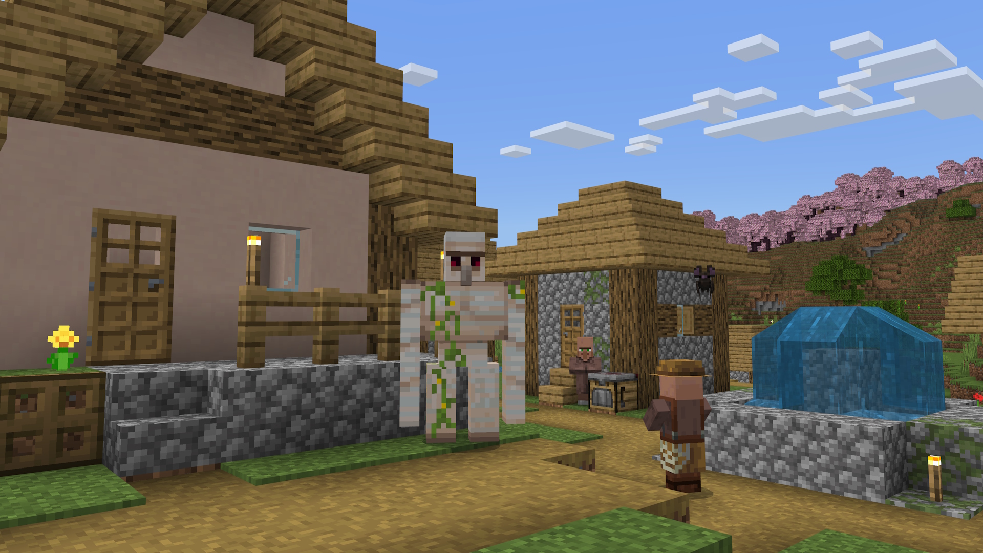 A Minecraft screenshot of an Iron Golem and some villagers, with a bat in the scene, in a village