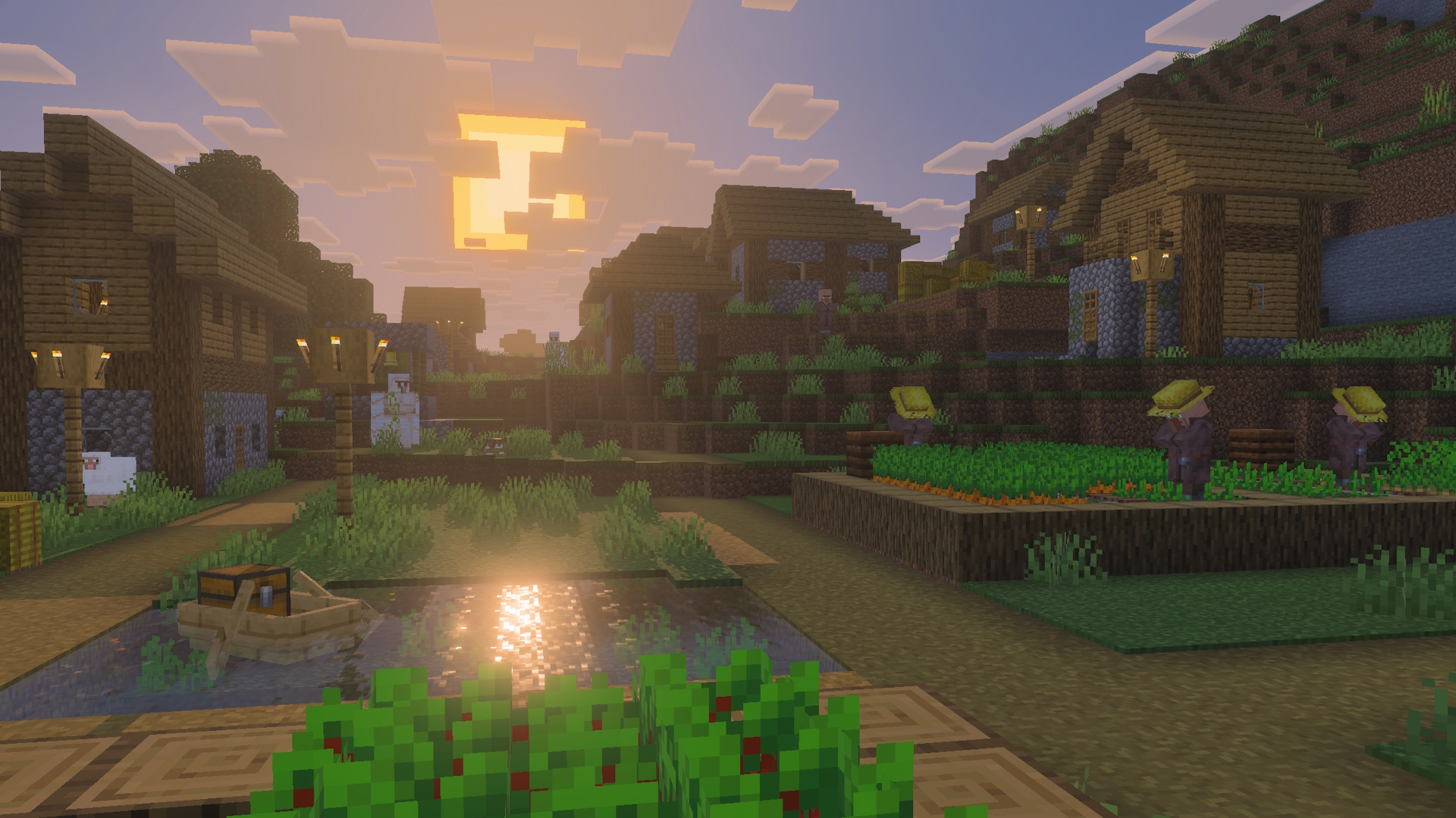 A Minecraft village at sunrise. There is a boat with a chest on some water in the foreground.