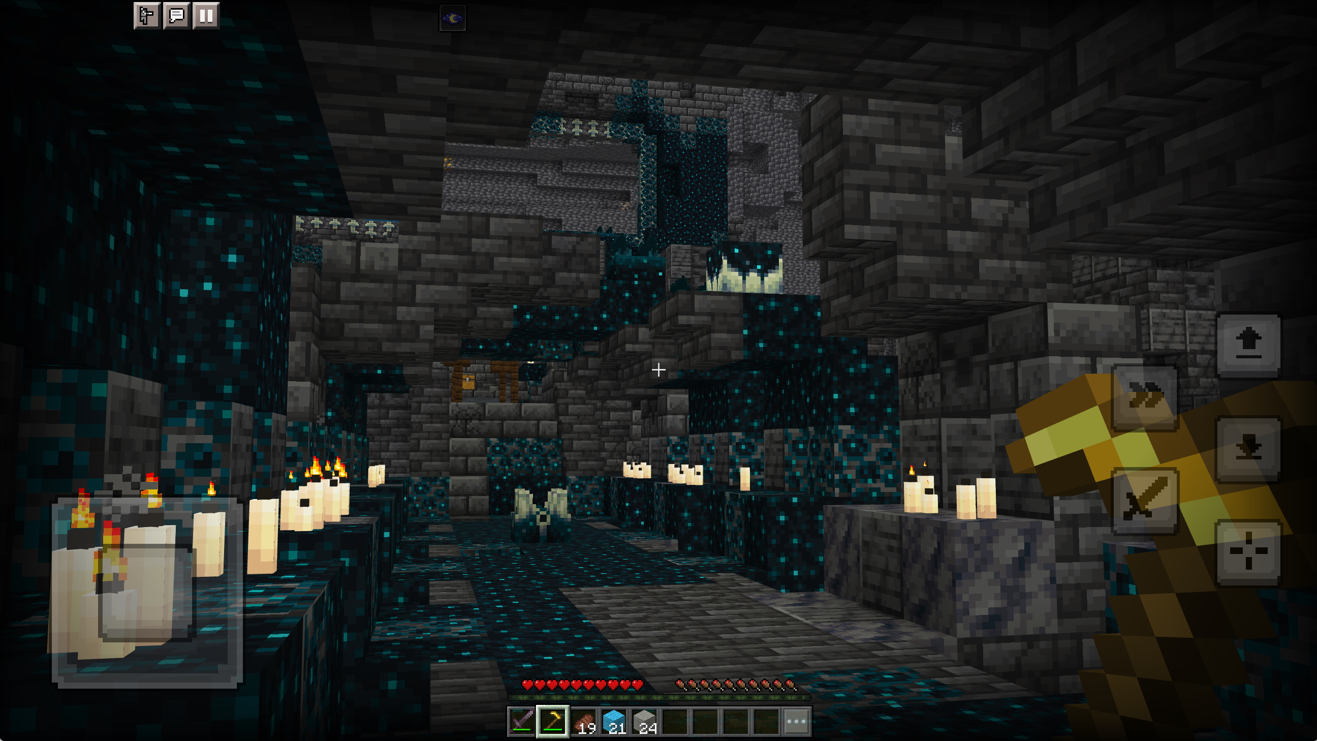 A Minecraft screenshot of the Deep Dark, showing new mobile touch controls